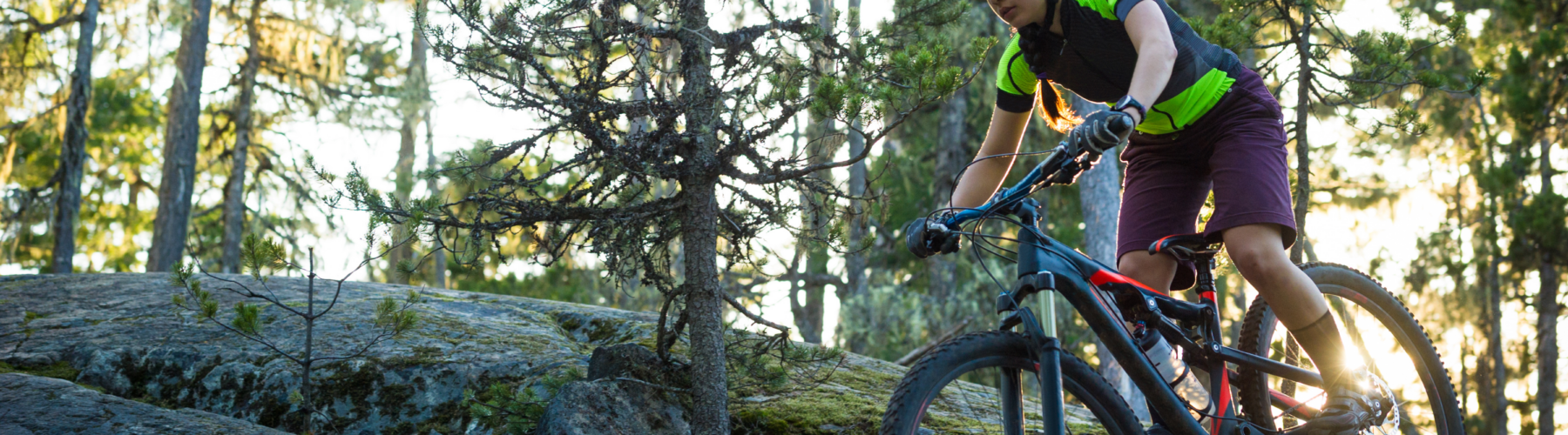 a woman mountain biking in lake tahoe on one of the 7 beginner friendly bike trails in lake tahoe